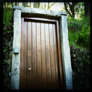 A secret door in the hillside? With security? Where could it lead?
